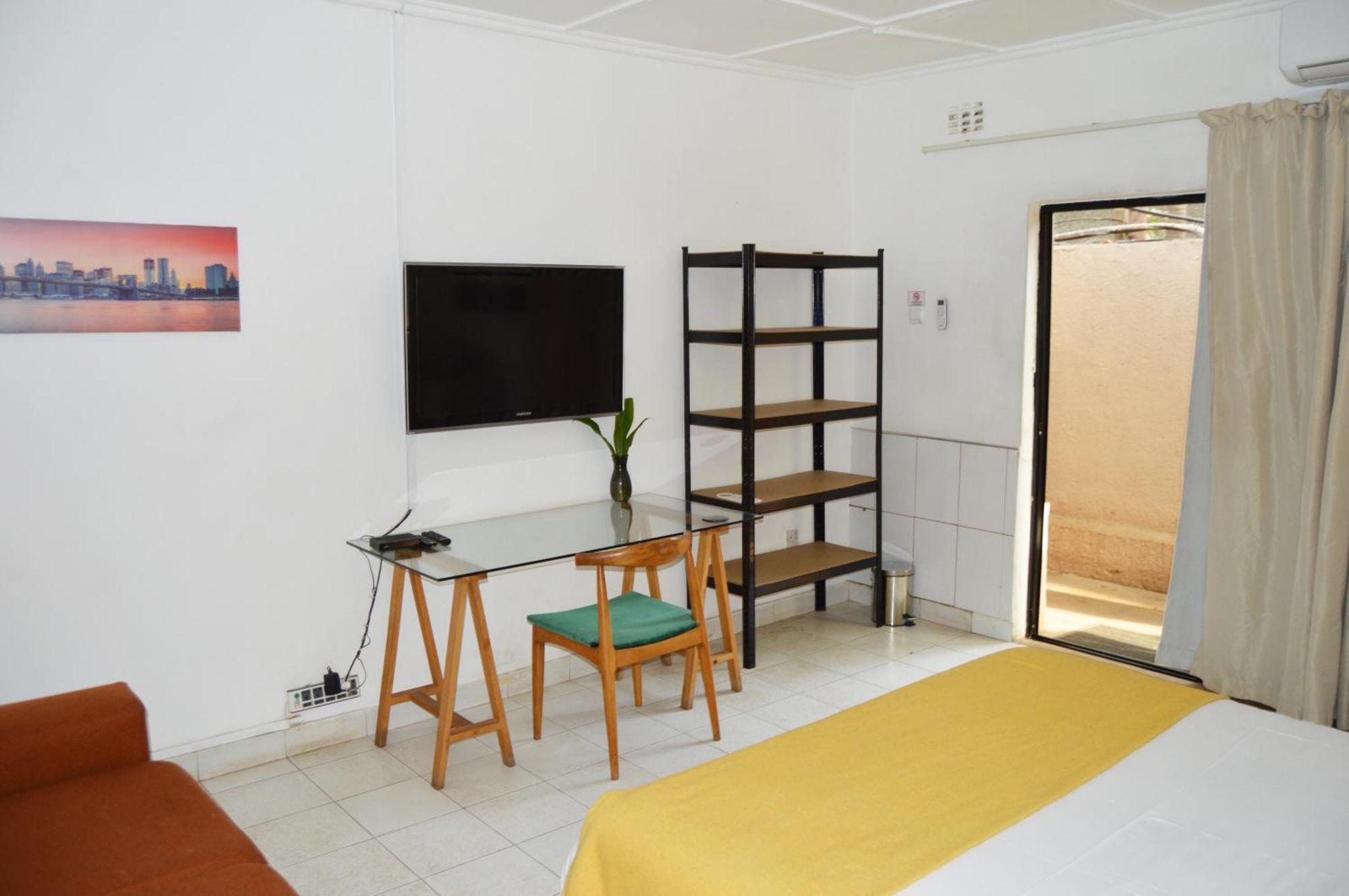 Bougainvilla Boutique Hotel & Restaurant Лубумбаши Экстерьер фото